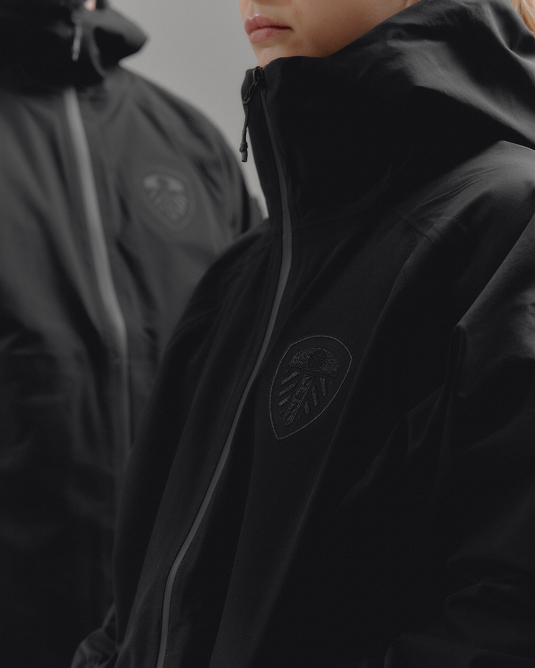 AOF Leeds United Shell Jacket | Black Coat | Art of Football
